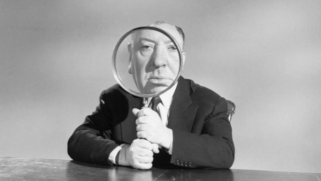 Black and white portrait of Alfred Hitchcock